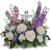 A touching tribute to love, this beautiful bouquet of cream roses and