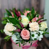 
The flower can be changed due to seasonality, but the color scheme