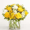 Send a ray of sunshine through this arrangement that features yellow roses