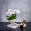 Imagine an ethereal oasis captured in a glass pedestal vase named &quot;Enchanted