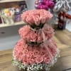 Beautiful floral arrangement made with 125 pink roses, and baby breath!