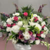 A floral arrangement designed to enhance any event with elegance and style.