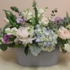 A super chic arrangement filled An exquisite arrangement bursting with vibrant hydrangeas