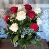 A prefect mix of premium red and white roses with assorted greens.