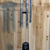 This wind chime is 44&rdquo; inches long and reads and In memory