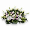 A Funeral Basket consisting of Dahlias, Lilies, and Roses. This design is