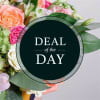 Beautiful seasonal flowers in a vase designed by a Local Florist