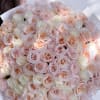An enchanting arrangement of ivory and champagne garden roses, Ivory Dream is