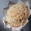 A stunning bouquet of fresh light peach roses, perfect for any occasion.