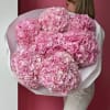A stunning bouquet of fresh pink hydrangea, perfect for any occasion. Wrapped