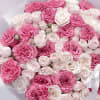 A luxurious medley of vibrant fuchsia, blush pink, and creamy white roses