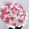 A luxurious medley of vibrant fuchsia, blush pink, and creamy white roses