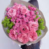 A bold and cheerful bouquet of vibrant pink garden and spray roses
