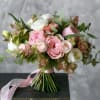 Indulge in the exquisite elegance of our luxurious hand-tied bouquet, a true