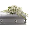 Matching luminous all white flowers and delicate garden greenery is an elegantly