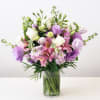 The Little Stars flower arrangement comes with a seasonal variety of blooms