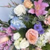 The &ldquo;Circle of Life&rdquo; easel masterpiece is a colorful memorial piece for