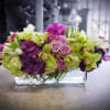 Whimsically enchanting blended row of luscious Roses, extravagant Orchids and plush Hydrangeas