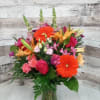 Bask in the warm glow of the Sweet Sunset arrangement&mdash;a radiant blend