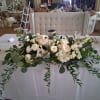 Vintage romantic white garden and standard roses, anemones, stuck, daisies, carnations and