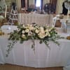 Vintage romantic white garden and standard roses, anemones, stuck, daisies, carnations and