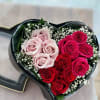 Assorted colors of roses in heart-shaped box in 2 sizes. Standard: 12
