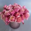 30 stems of flamingo pink roses and a rose gold or silver