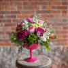 An elegant all around design in a classy pedestal container. The footed