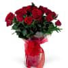 This gorgeous arrangement is made up of red roses with two balloons.