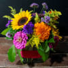 A quaint flower farm arrangement made for any occasion!
