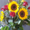 Pop of warmth in a glass vase to add sunshine to someone&#039;s
