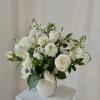 Gracefully Elegant is a modern and compact white arrangement filled with imported