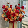 Express your deepest emotions with this heart-shaped arrangement of radiant red and