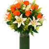This arragement of lilies and roses is graceful and elegant perfect for