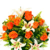 This arragement of lilies and roses is graceful and elegant perfect for