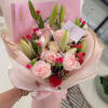 A soft and sophisticated bouquet with lilies and roses in pastel shades!