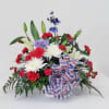 These colors don&#039;t run. Floral basket in honor of all American Patriots.