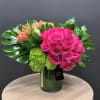 &quot;Coral &amp; Fuchsia&quot; is a stylish and modern arrangement that showcases the