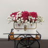 An elegant mini handbag of fresh pink roses and baby&rsquo;s breath &mdash;