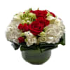 An elegant and timeless arrangement is perfect for any occasion. All white