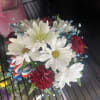 fresh flowers in American flag container 