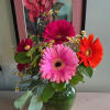 Nothing happier than gerbera daises... Five assorted colored blooms arranged in a