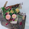 This assortment of seasonally sourced blooms is ready for your vase. Hand