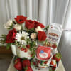 This strawberry teapot filled with coordinating flowers is sure to delight mom