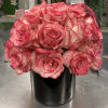 Two dozen roses of any color upon customers request.