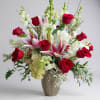 In a grand display of romantic elegance, a lavish arrangement adorns a