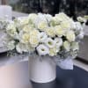 Gorgeous box with a mix of white flowers! The arrangement was made