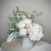 When words escape you, say it with flowers. This serene arrangement is
