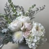 When words escape you, say it with flowers. This serene arrangement is