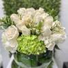 Hydrangeas and Roses Arrangement: FishBowl vase arrangement accented with hydrangeas, greens, and